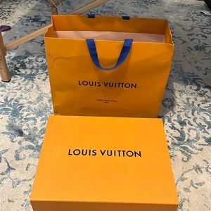 Louis Vuitton box, duster, ribbon, and bag